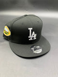 New Era Edicion LA Negro Visera Rosa Broche
